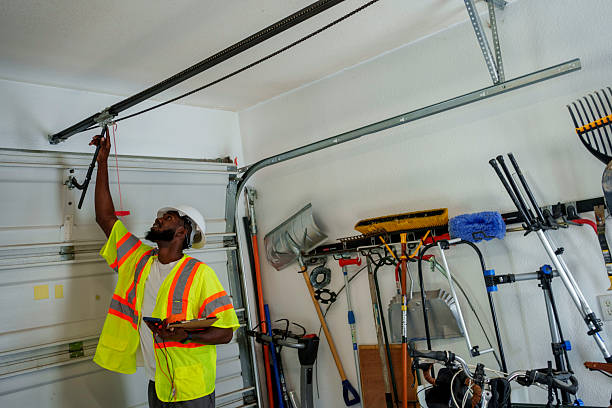 Professional Garage Door Panel Replacement technician working in English, IN
